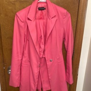 This is a PrettyLittleThing pink size 0 two piece office set.